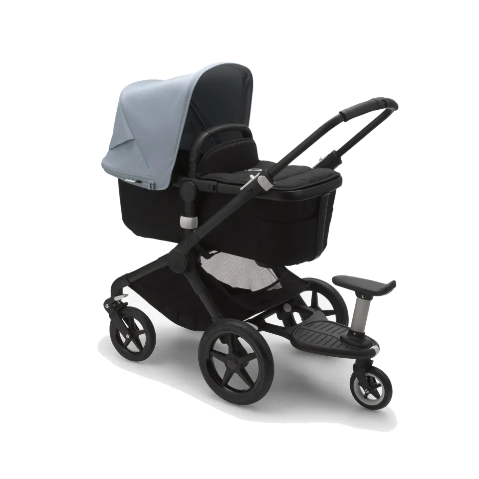 Bugaboo ståbräda med sits låter barnet vila under färden.