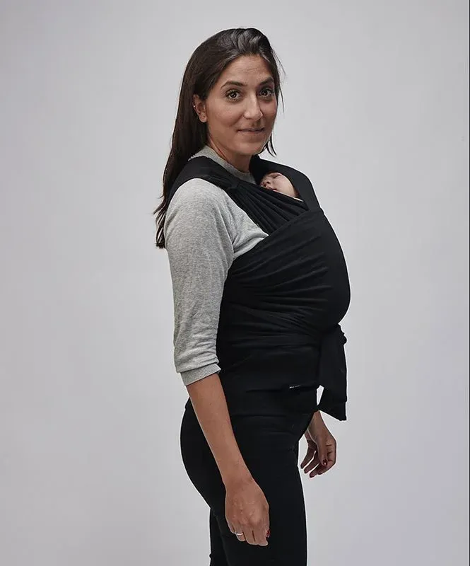 Najell Wrap bärsjal är färdigknuten och riktigt smidig att använda.